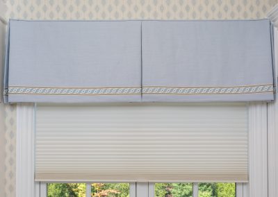 Newton home, roman shades, Hunter Douglas blind, honeycomb blind, LiteRise, cordless blind, valance, box-pleated valance, window treatment, window covering, blue linen curtain, braid trim, banding, blue and white wallpaper, white shade, bathroom window treatment, master bathroom