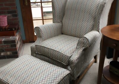 custom upholstered chair with matching ottoman