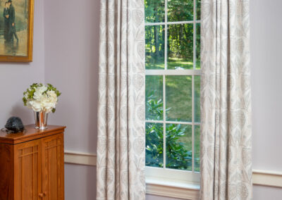 Inverted Pleat Drapes on Gold Rod